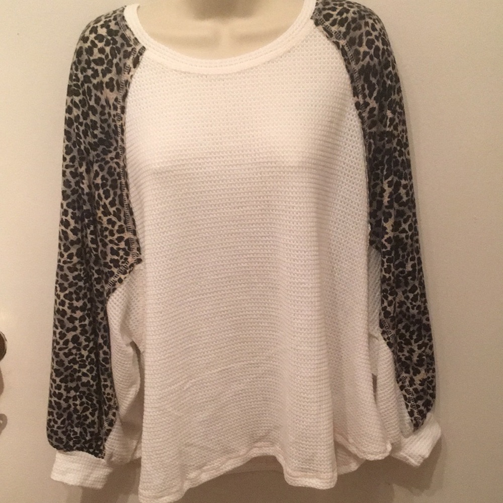 Fun shirt two tone white with Leopard Bell sleeves.